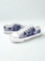 white canvas low top shoes