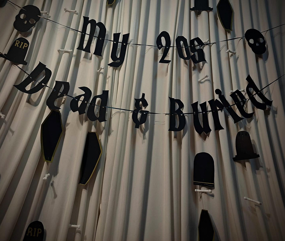 Ivory Fabric Backdrop with Gothic Glam Strands and My 20s Dead & Buried Banner