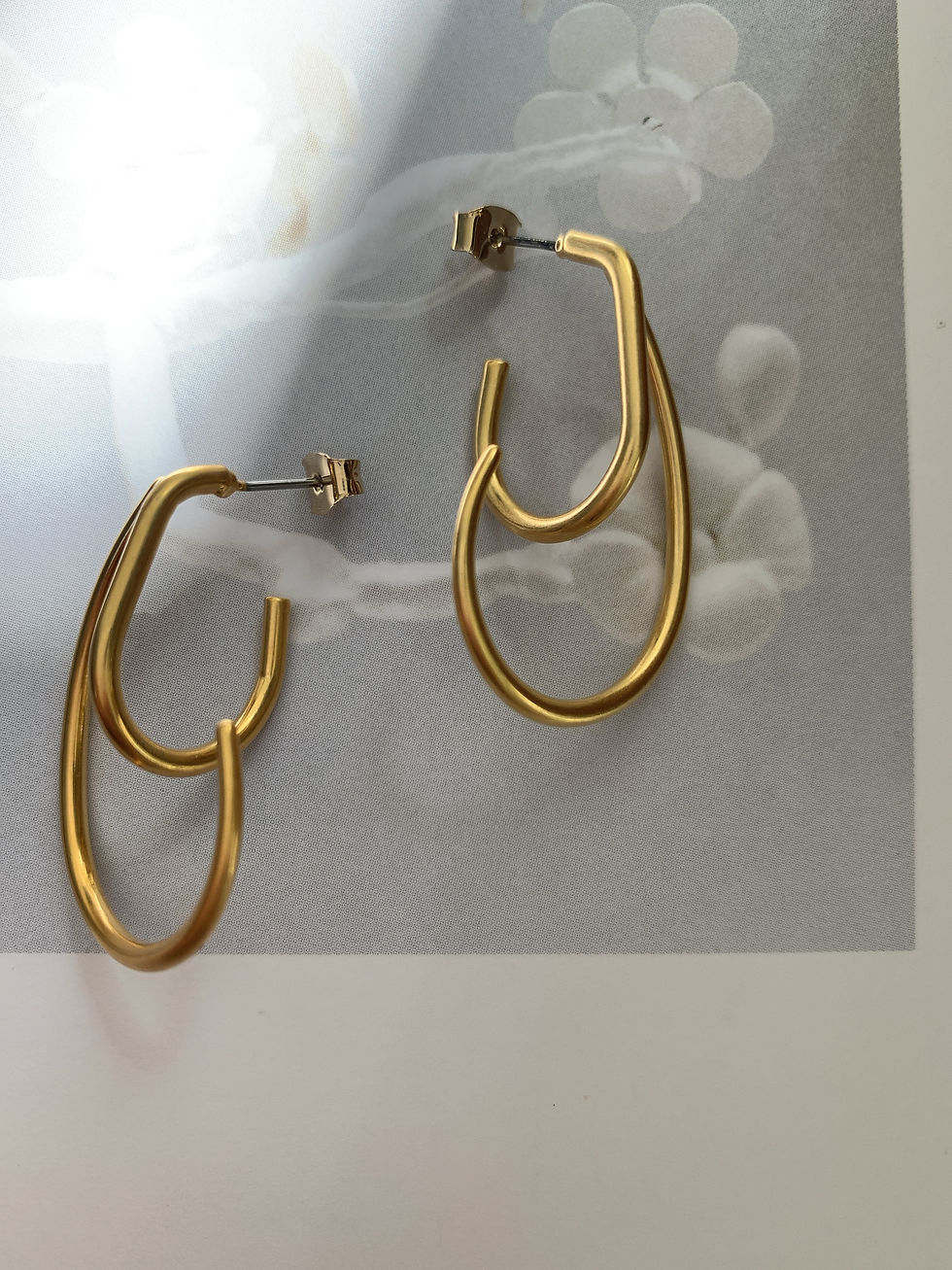 Thumbnail: Abstract Golden Double Hooks Earrings