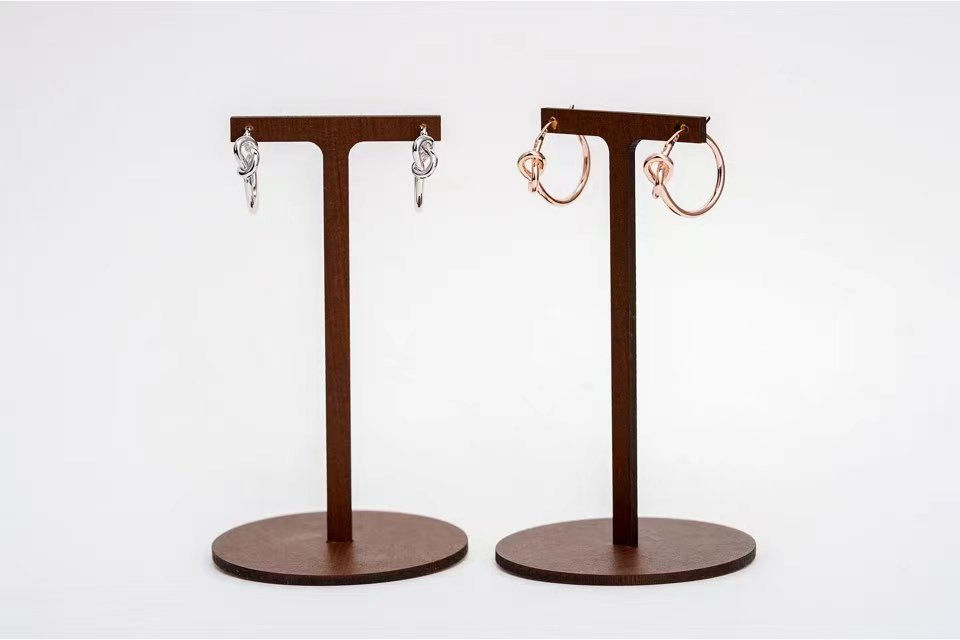 Thumbnail: Knot Small Hoops in Sterling Silver