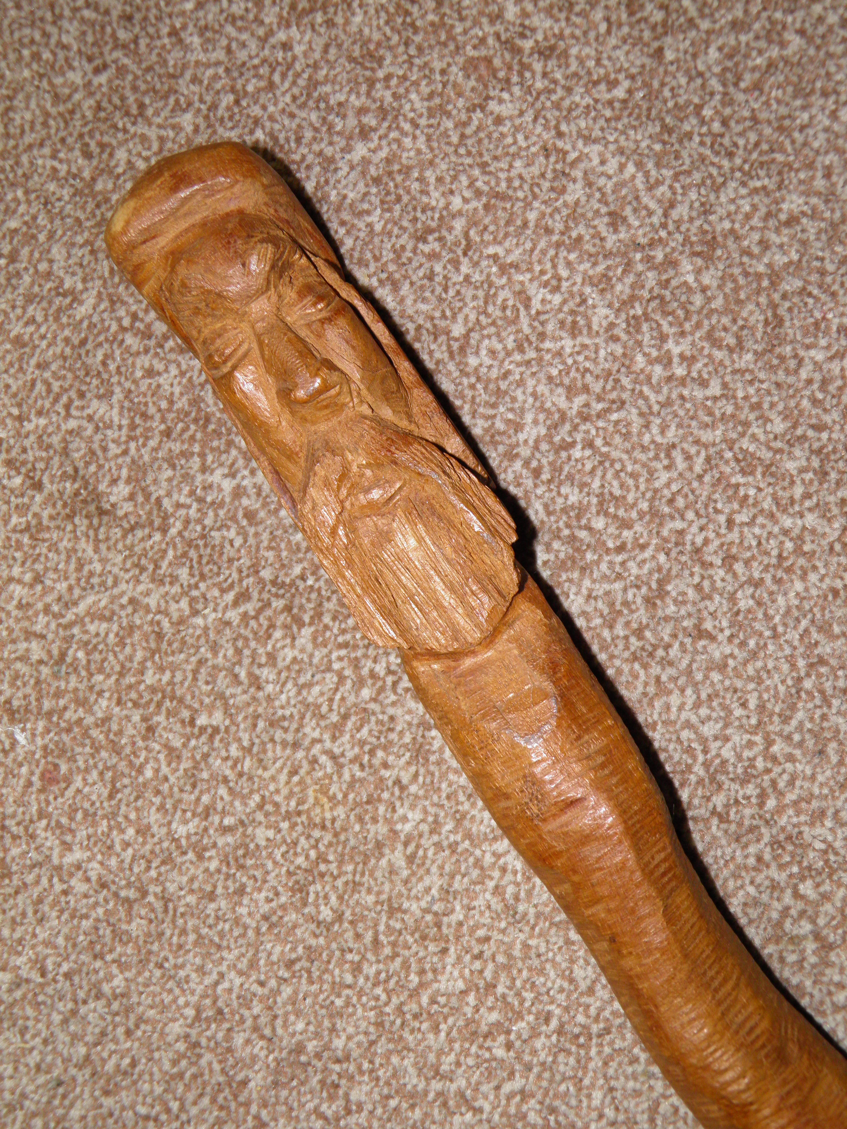 Vintage African Tribal Walking Stick Featuring a hand carved handle in the form of a bearded mans head The stick is heavy wei