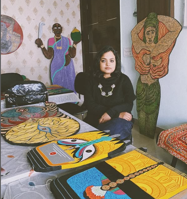Artist Portia Roy in her studio with her works. The studio has all her works.