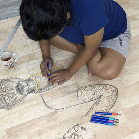 Artist Portia Roy working in her studio, The Artist Who Refuses to Look Away: Can Art Change the World?