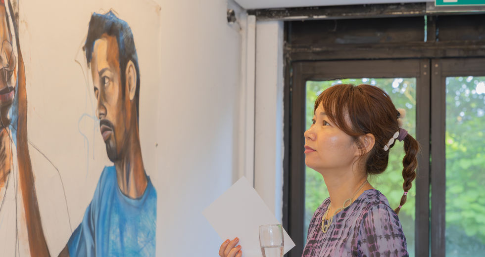 visitor during a exhibition in UK. It featured a indian artist and his debut in UK