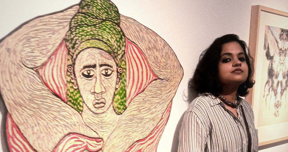 Portia Roy in a exhibition. We support her through our individual artist services in career development for the artists