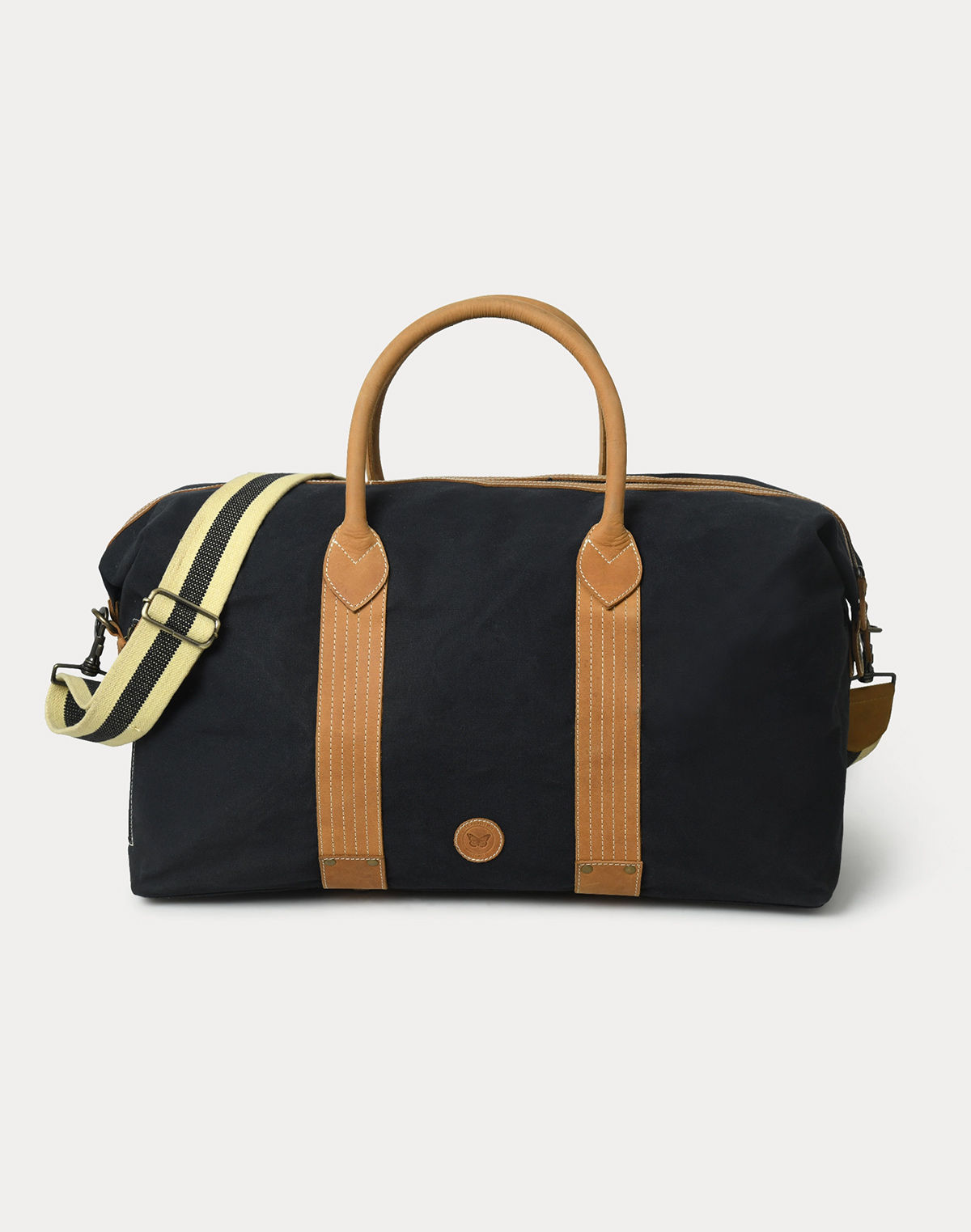 black canvas duffle bag with leather details