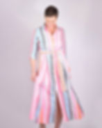person wearing white, blue and neon striped dress - front view