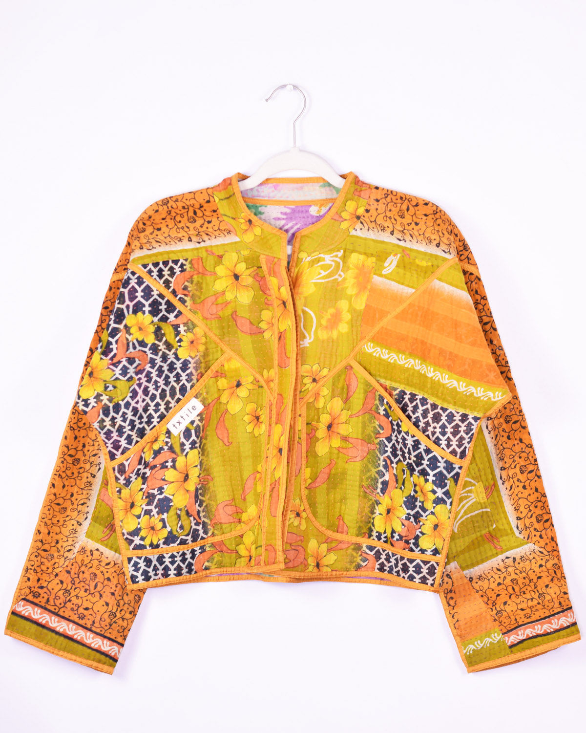 Orange cropped jacket made from kantha quilts front