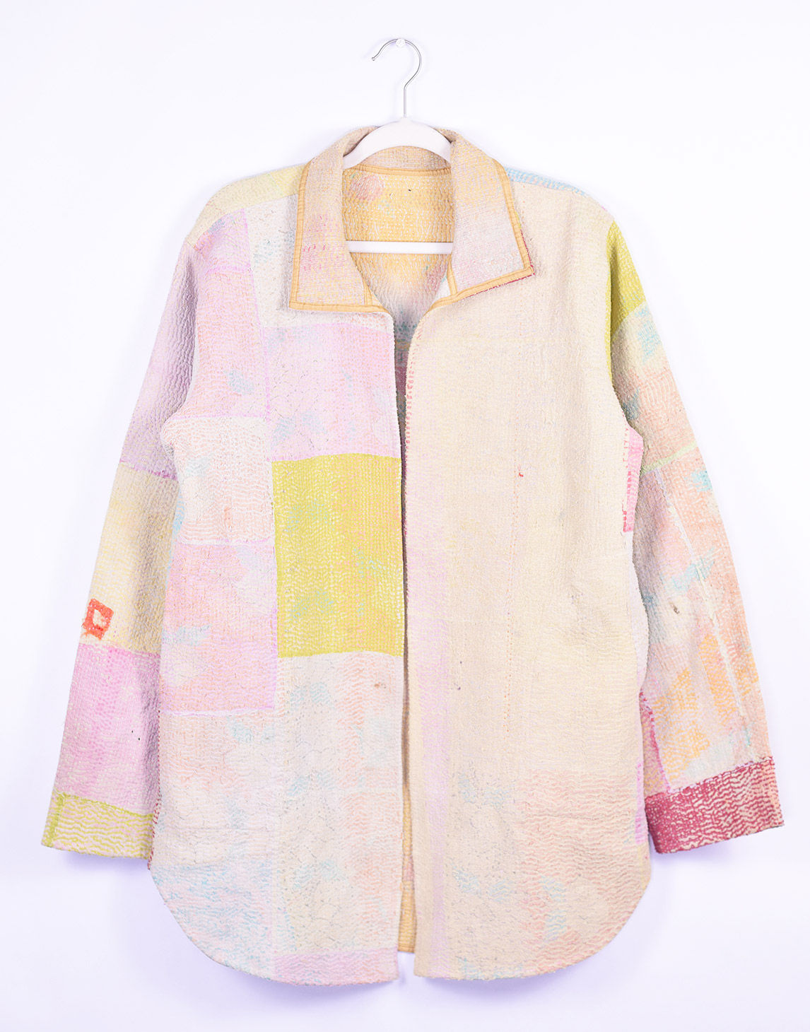 Statement piece - long jacket made from light colored patchwork quilt - FRONT