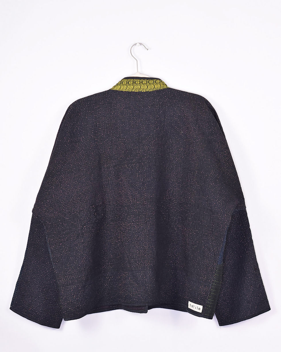 quilted oversized jacket made from a black kantha quilt with gold trim