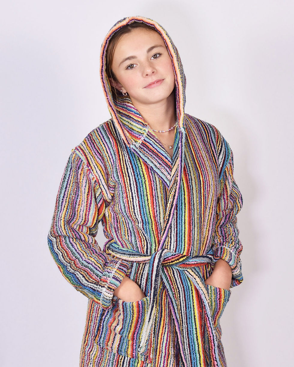 Kid waring terry cloth robe made from rainbow striped threads