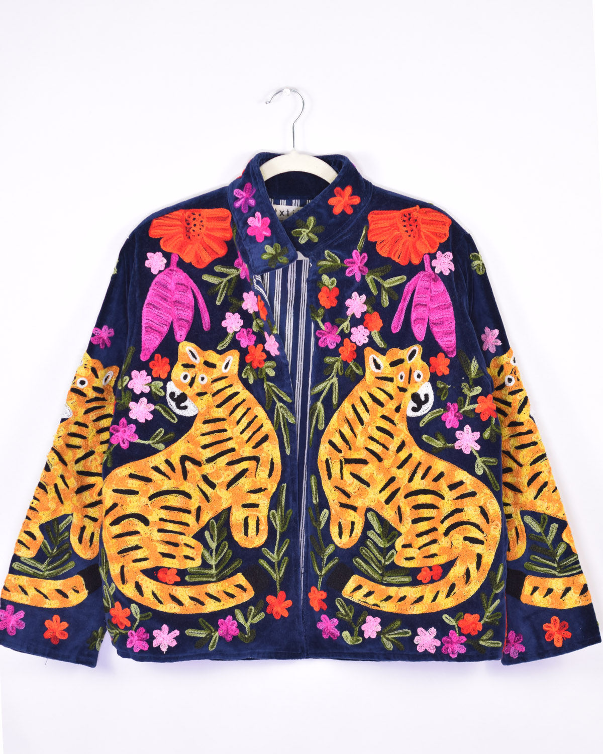 navy blue velvet jacket with giant tigers embroidered on it - front view
