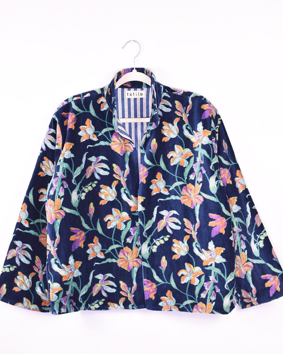 dark blue velvet jacket with tropical flowers printed on it - front view