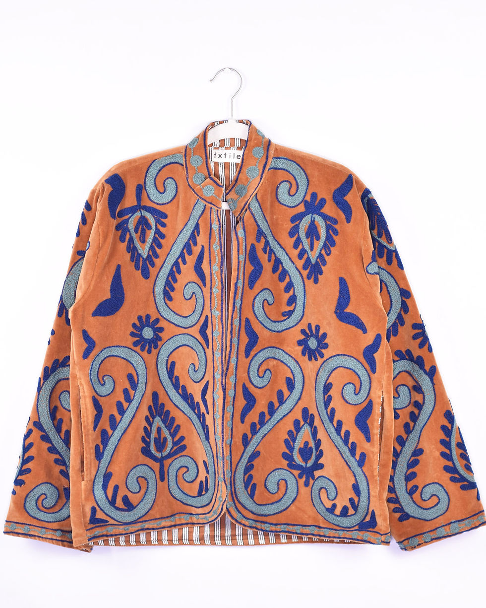 tan embroidered jacket with blue suzani embroidery - front view