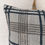 Thumbnail: grey and black checkered pillow on a bed