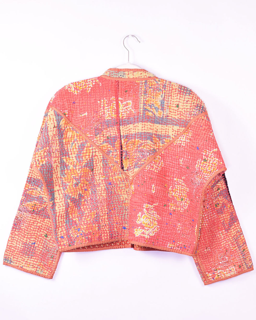 Coral colored jacket made from repurposed quilts