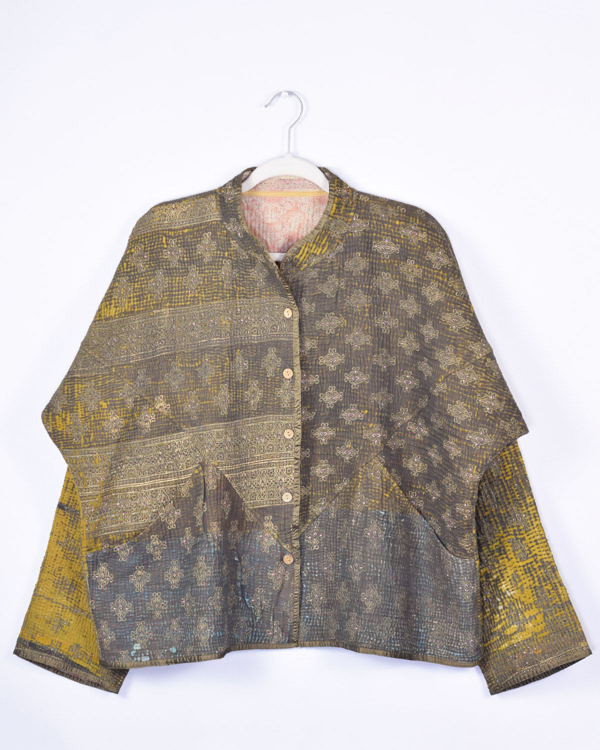 quilted jacket made from neutral colored kantha quilts back