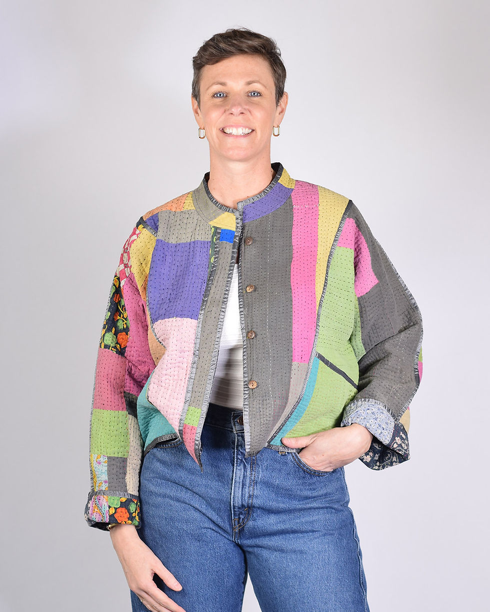 Person wearing color blocked cropped quilted jacket - front view