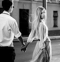 Young fashion couple walking down the street in summer in europe_edited.jpg