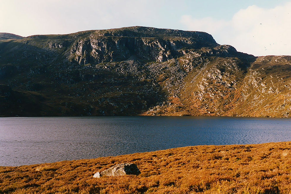 View if Llyn Arenig Fawr in Wales - Image by Nigel Brown