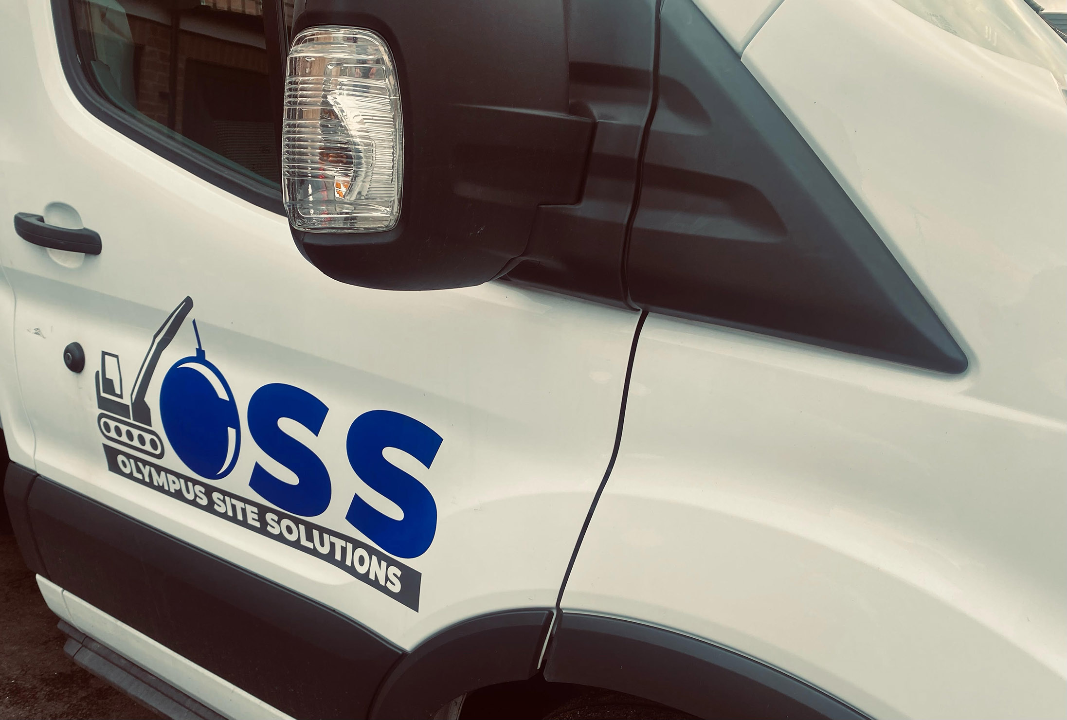 OSS branded contractor vehicle on site
