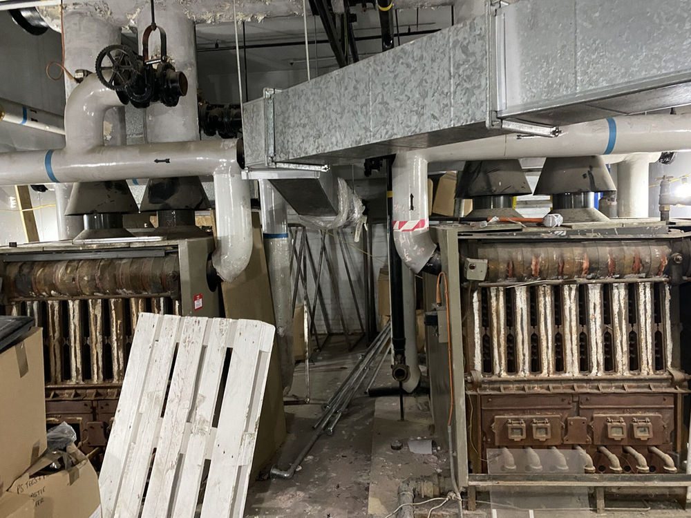 OSS team removing large cast iron boilers and heavy plant in Newcastle — M&E plant removal