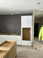 installing cabinets.jpg