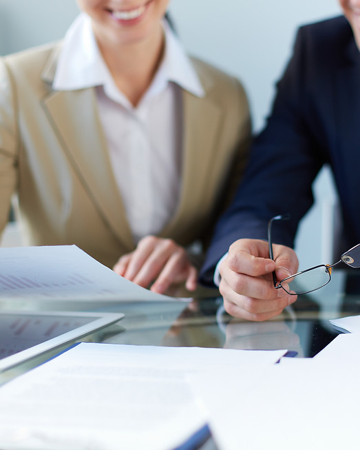 close-up-businessman-holding-his-glasses.jpg