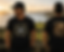 Man in black 'Grip It' golf t-shirt, front and back, sunset golf course.