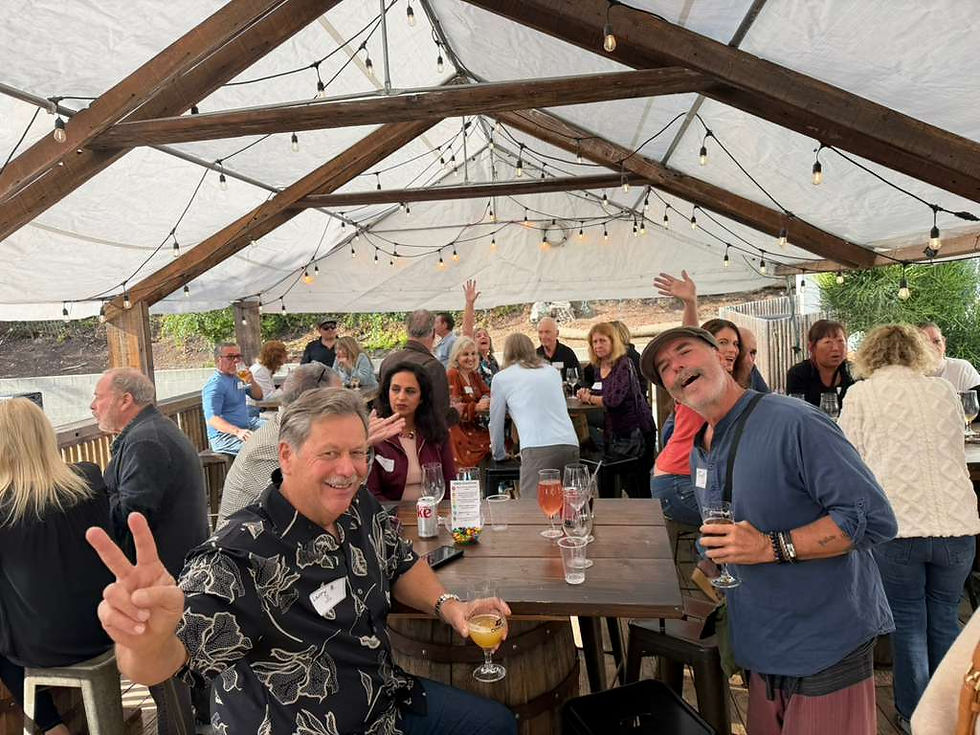 Guests enjoying Kindred Social’s December Mixer at The Stonehaus.