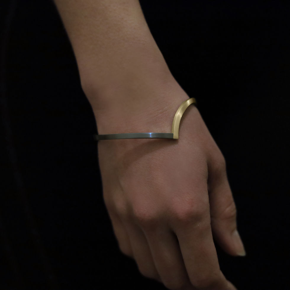 Handmade Bangle by Rhys Turner, Melbourne. Featuring 9ct Yellow Gold and Oxidised Silver