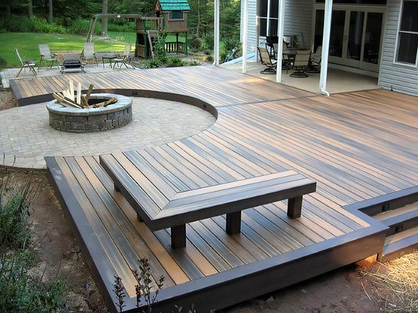 Custom Ipe deck featuring a built-in fire space, creating a warm, stylish, and functional outdoor living area.