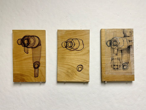 Series of Zbrush-Rhino mesh figure with one knee raised captured from above. Sections were taken at joints and head and torso in the center composition. On the right, pen was used on trace paper to fill out the image and add context. This trace paper was adhered to the plywood with hot wax.
