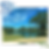 A nearly completed puzzle of a bright, clear day with a blue sky, green trees, and a calm lake, with remaining pieces gathere