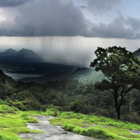 Coming storm cloud in a valley.