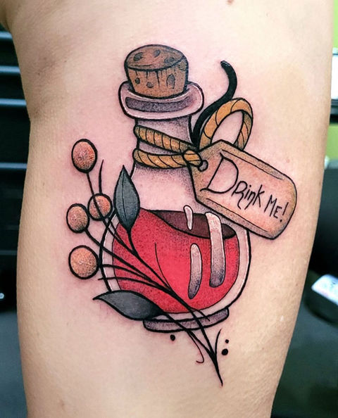 Colourful neo traditional tattoo of a health potion
