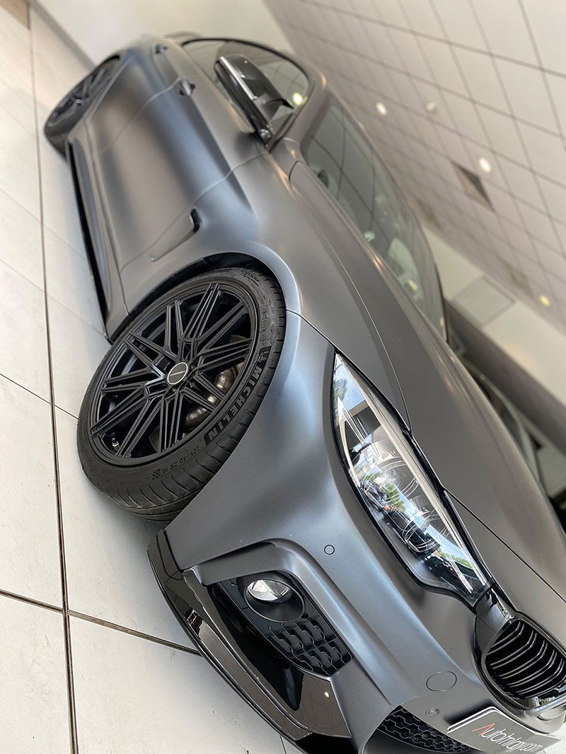 Full side view of XPEL stealth paint protection film on a car