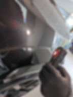 checking for scratches on car paintwork
