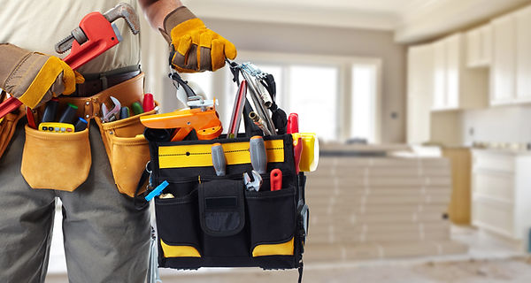 Person carrying renovation tools