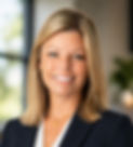 Professional headshot of a smiling woman