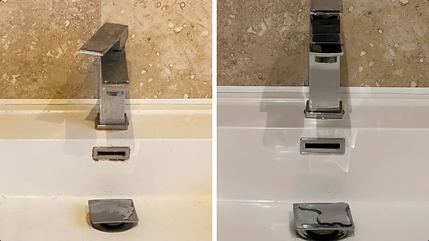 Clean and organised bathroom sink with a polished surface and neatly arranged toiletries.
