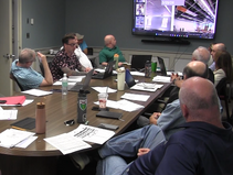 Subcontractor Performance (Ferguson Electrical): A major grievance was aired regarding the electrical subcontractor, Ferguson Electrical. The committee noted extreme frustrations with delayed change-order pricing and inflated labor estimates (e.g., billing 640 hours via software estimations for work that took less than 60 hours in reality).      Resolution: The committee noted they will continue to enforce Time & Material (T&M) "not-to-exceed" directives to keep costs accurate, and OMG's president has requested an emergency on-site meeting with Ferguson's ownership to address project speed and manning requirements.    Storage Facilities: The committee authorized $2,000 per school for Tecton Architects to draft schematic designs for permanent 20x40 storage sheds to hold building attic stock. This layout will be presented concurrently to Planning & Zoning alongside the upcoming district solar array initiatives.    Staircase Security Bulletin: At the request of school leadership, Tecton i