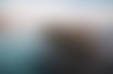 Mare al tramonto in lunga esposizione con scogli, esempio d'uso dei filtri fotografici ND