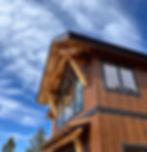 new windows on second story entry of home with wood siding - built by Averie Construction - South Dakota