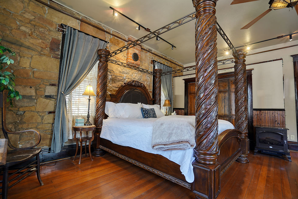 Luxury bed at FlatIron in Hot Springs, SD - historic sandstone inn - airbnb