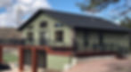 Forrest green siding on a home in the Black Hills - Averie Construcion