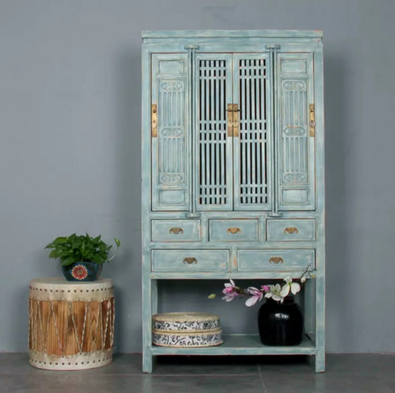 Blue antique Chinese cabinet and sideboard styled in a modern luxury interior
