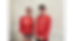 Kids taking picture in front of white wall_edited.png