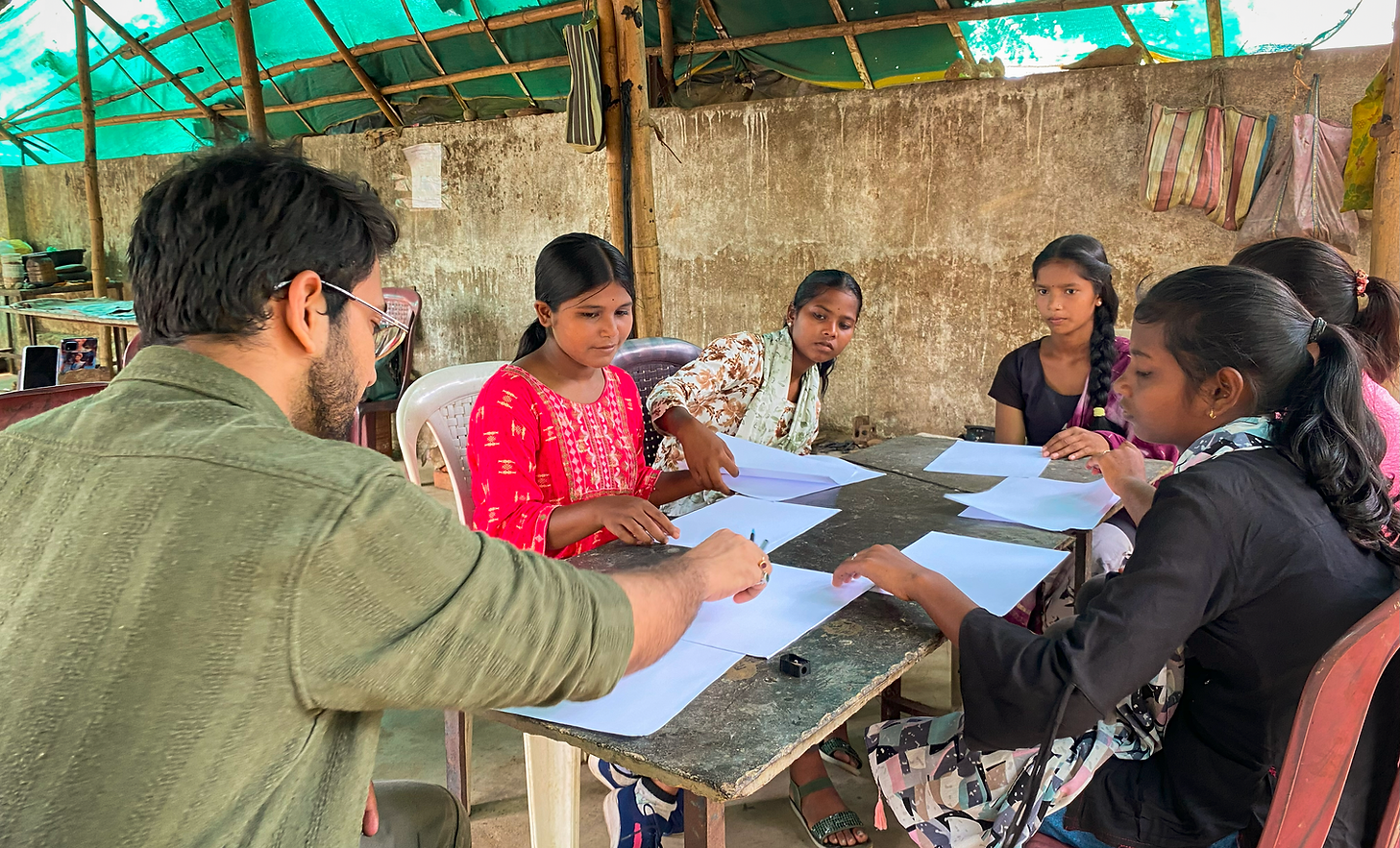 Founder Jay speaking to students during a reflective session on impact and purpose