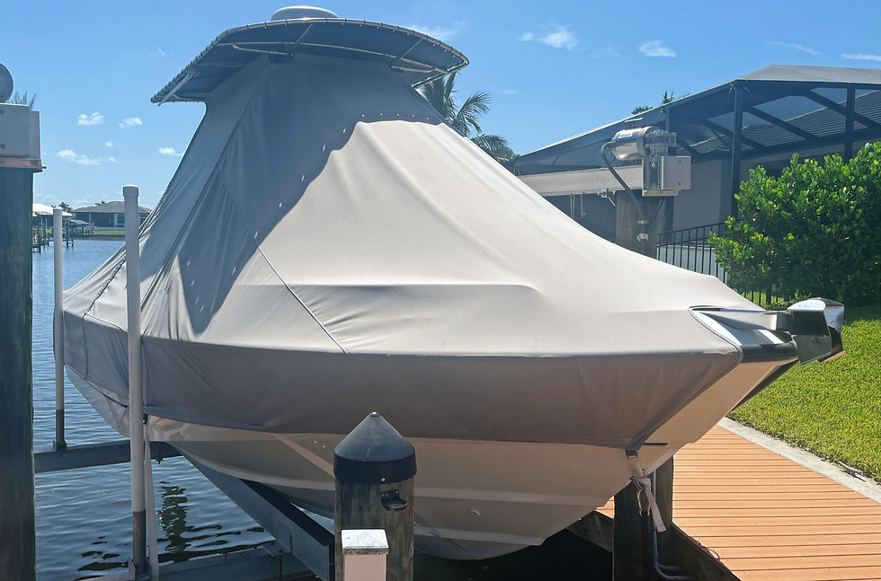 Close-up view of a well-fitted boat cover protecting a sailboat